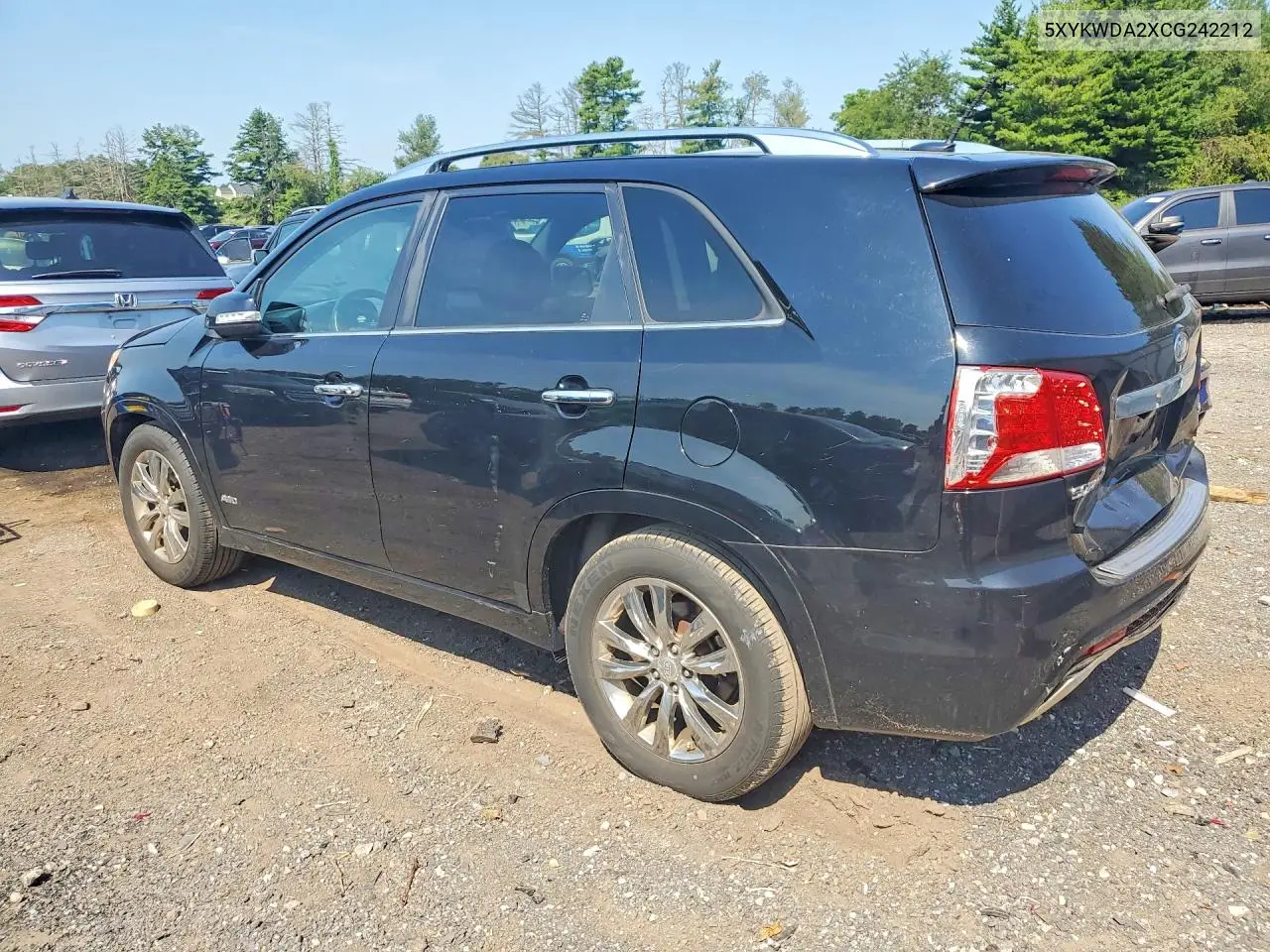 2012 Kia Sorento Sx VIN: 5XYKWDA2XCG242212 Lot: 60945716