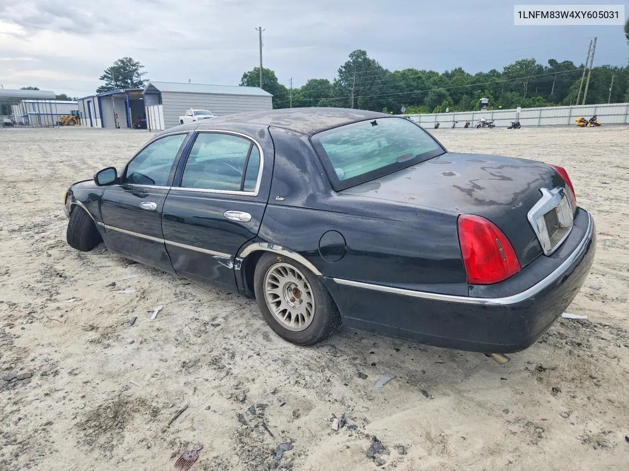 1999 Lincoln Town Car Cartier VIN: 1LNFM83W4XY605031 Lot: 57136636