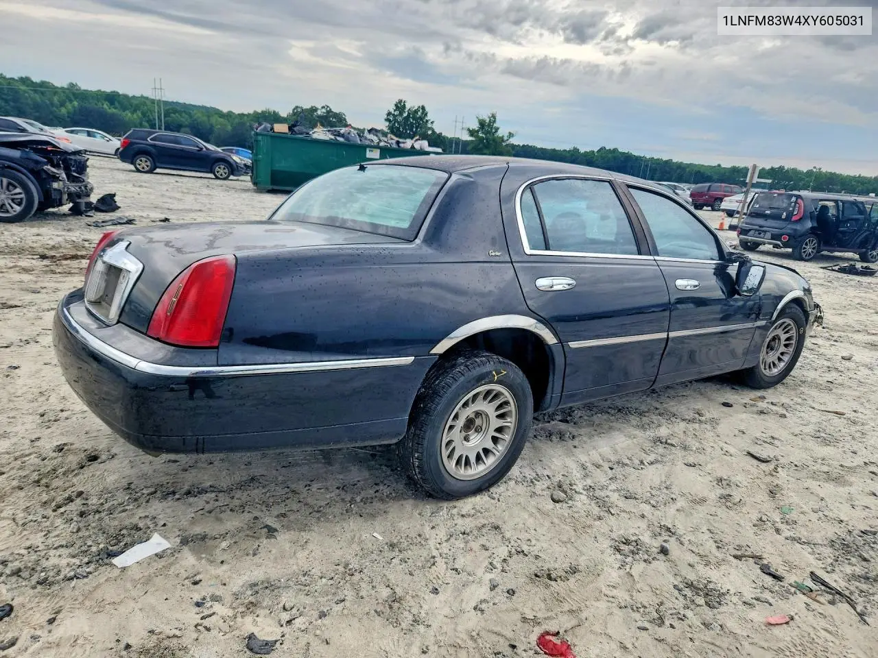 1999 Lincoln Town Car Cartier VIN: 1LNFM83W4XY605031 Lot: 57136636