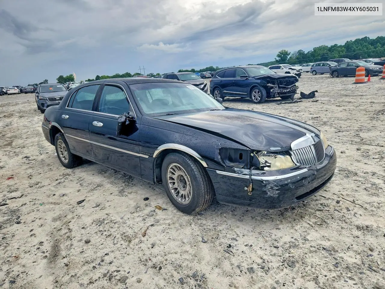 1999 Lincoln Town Car Cartier VIN: 1LNFM83W4XY605031 Lot: 57136636