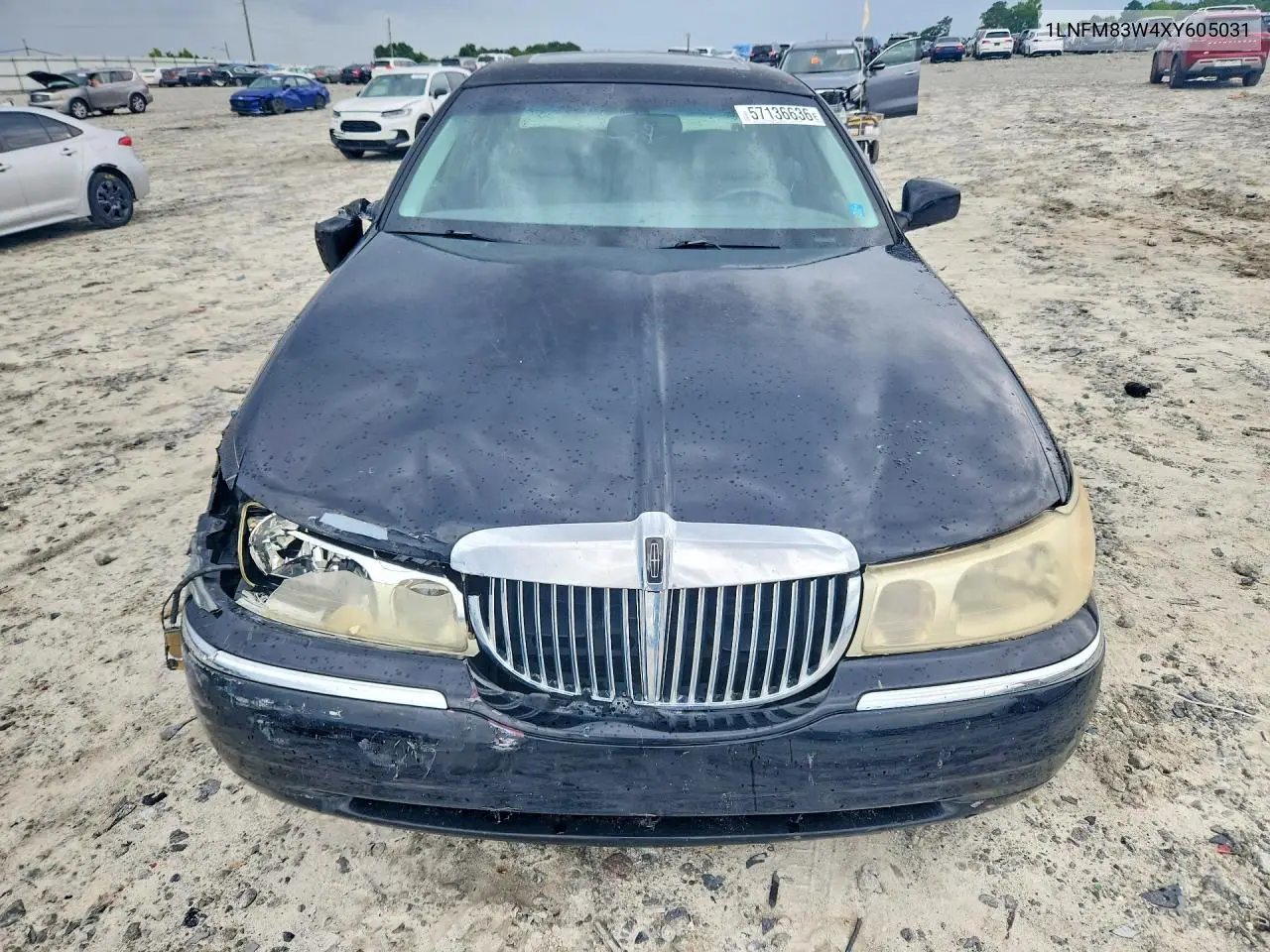 1999 Lincoln Town Car Cartier VIN: 1LNFM83W4XY605031 Lot: 57136636