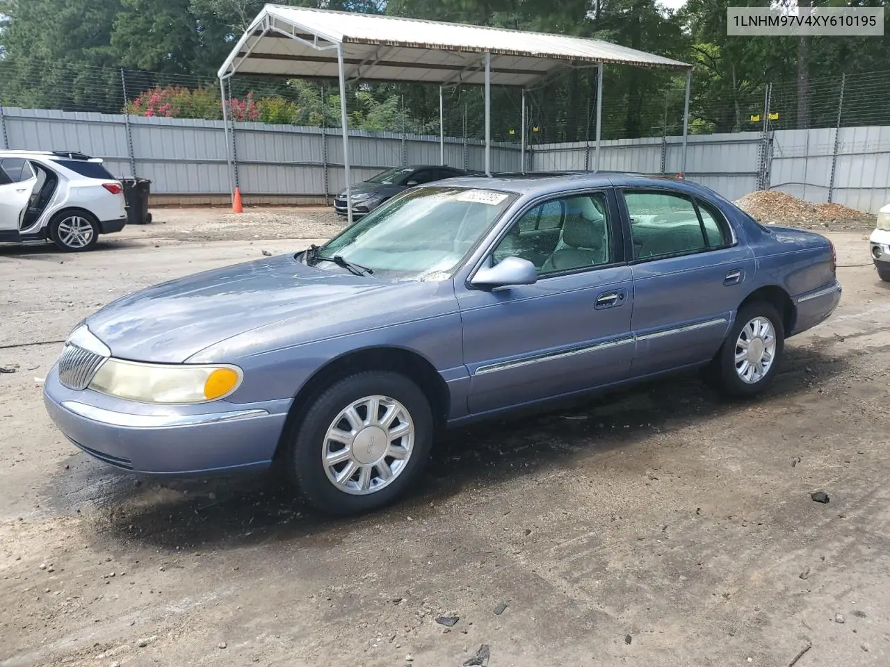 1999 Lincoln Continental VIN: 1LNHM97V4XY610195 Lot: 66072295
