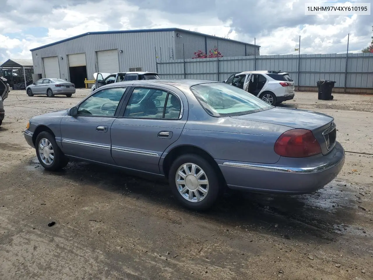 1999 Lincoln Continental VIN: 1LNHM97V4XY610195 Lot: 66072295