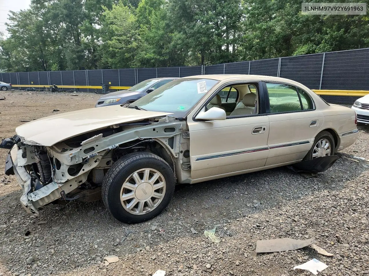 2002 Lincoln Continental VIN: 1LNHM97V92Y691963 Lot: 61473676