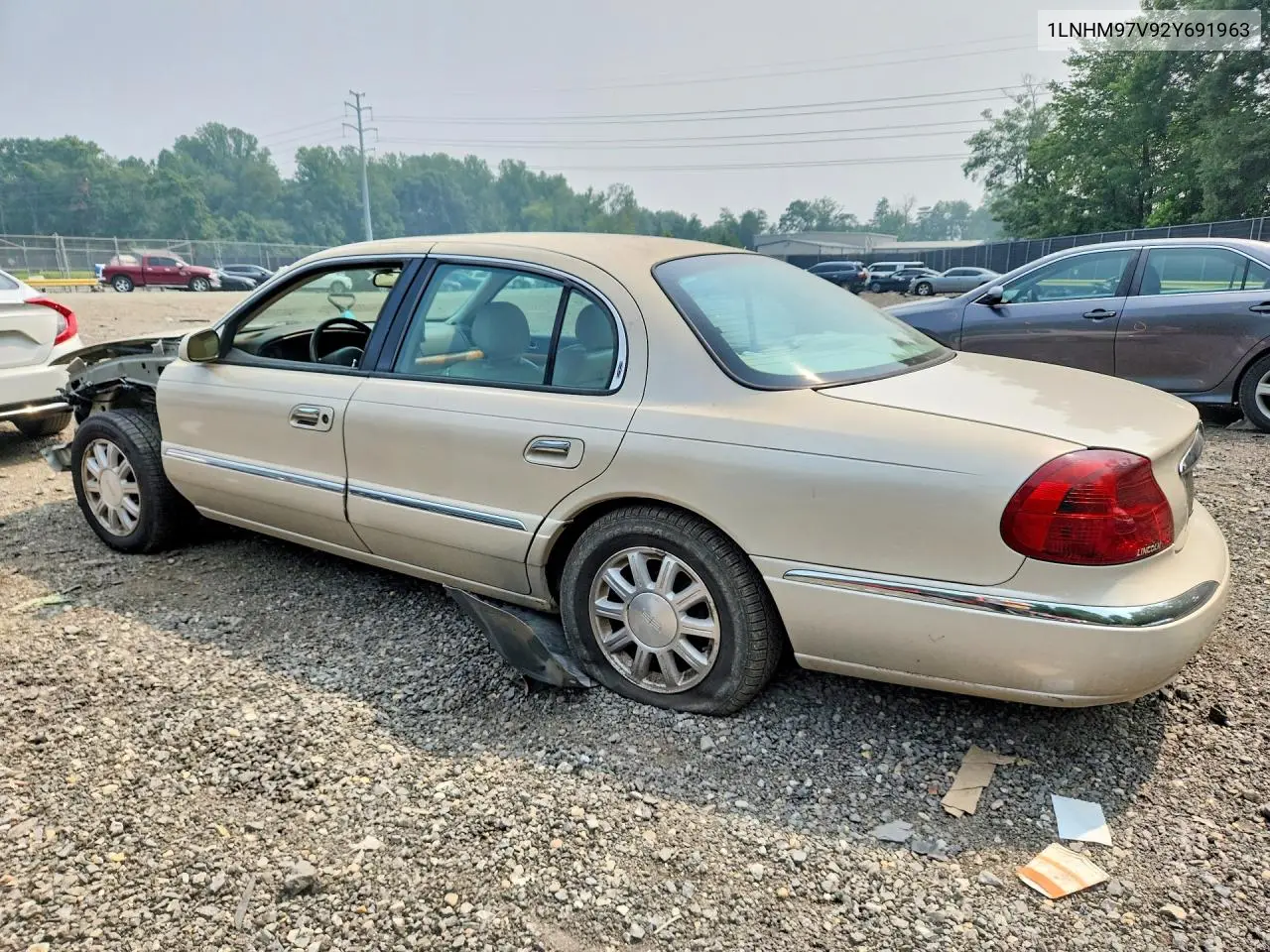 2002 Lincoln Continental VIN: 1LNHM97V92Y691963 Lot: 61473676
