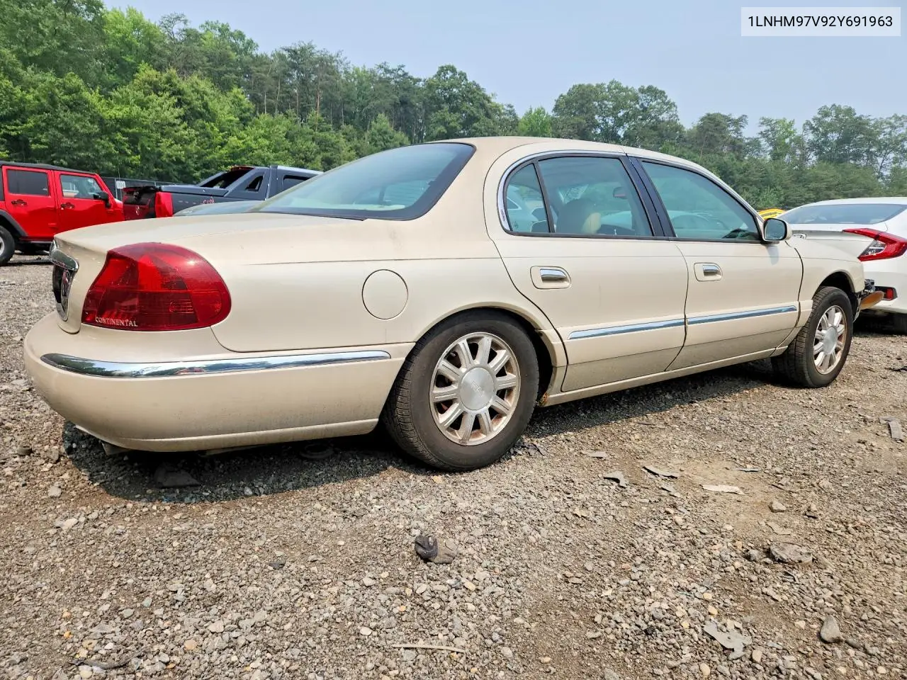2002 Lincoln Continental VIN: 1LNHM97V92Y691963 Lot: 61473676