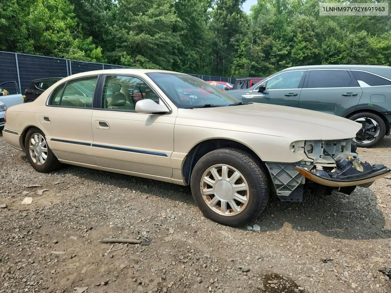2002 Lincoln Continental VIN: 1LNHM97V92Y691963 Lot: 61473676