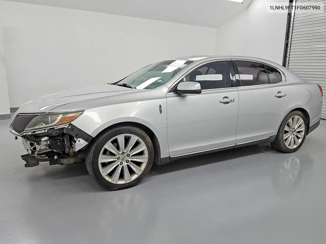 2015 Lincoln Mks VIN: 1LNHL9FT1FG607990 Lot: 51817836