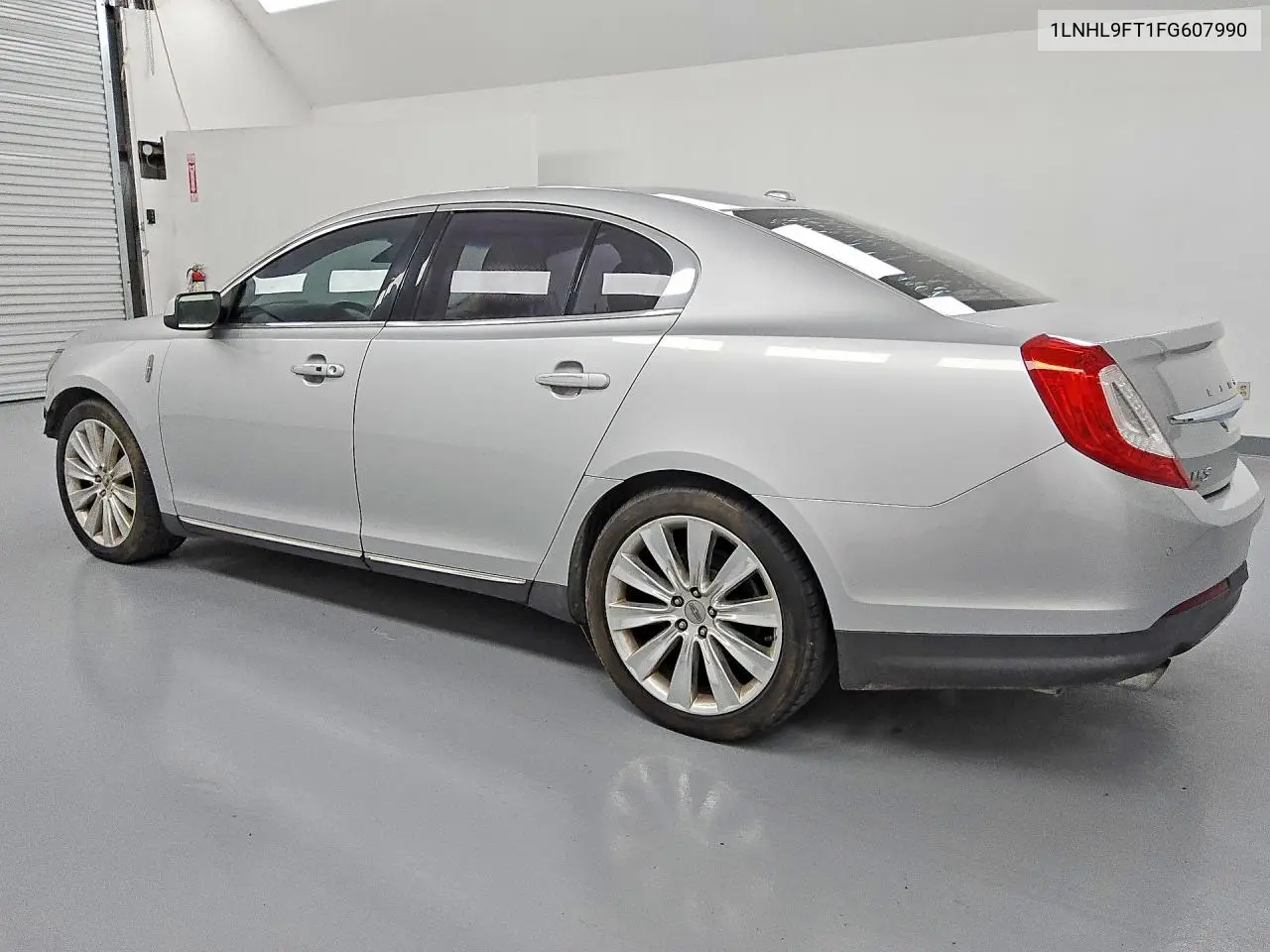 2015 Lincoln Mks VIN: 1LNHL9FT1FG607990 Lot: 51817836