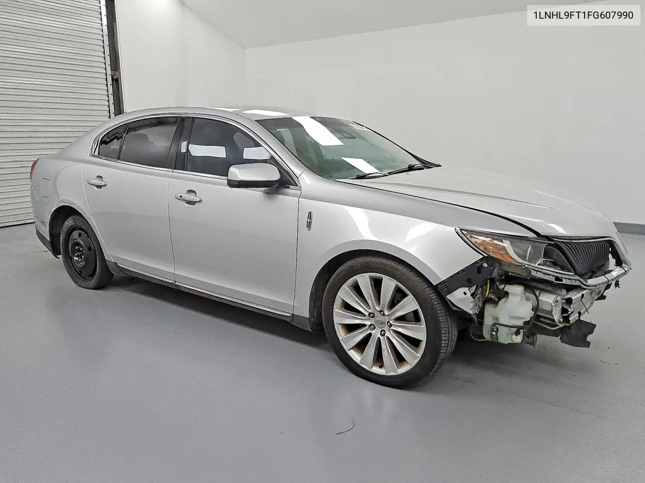 2015 Lincoln Mks VIN: 1LNHL9FT1FG607990 Lot: 51817836