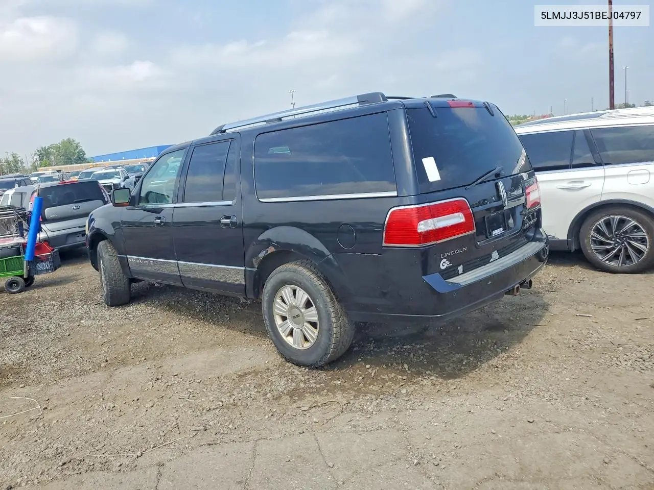 2011 Lincoln Navigator L VIN: 5LMJJ3J51BEJ04797 Lot: 60661816