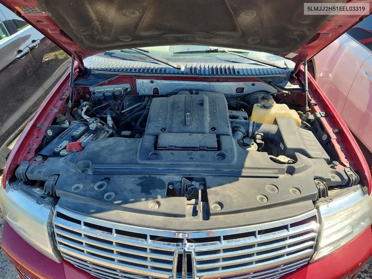 2014 Lincoln Navigator VIN: 5LMJJ2H51EEL03319 Lot: 59779476