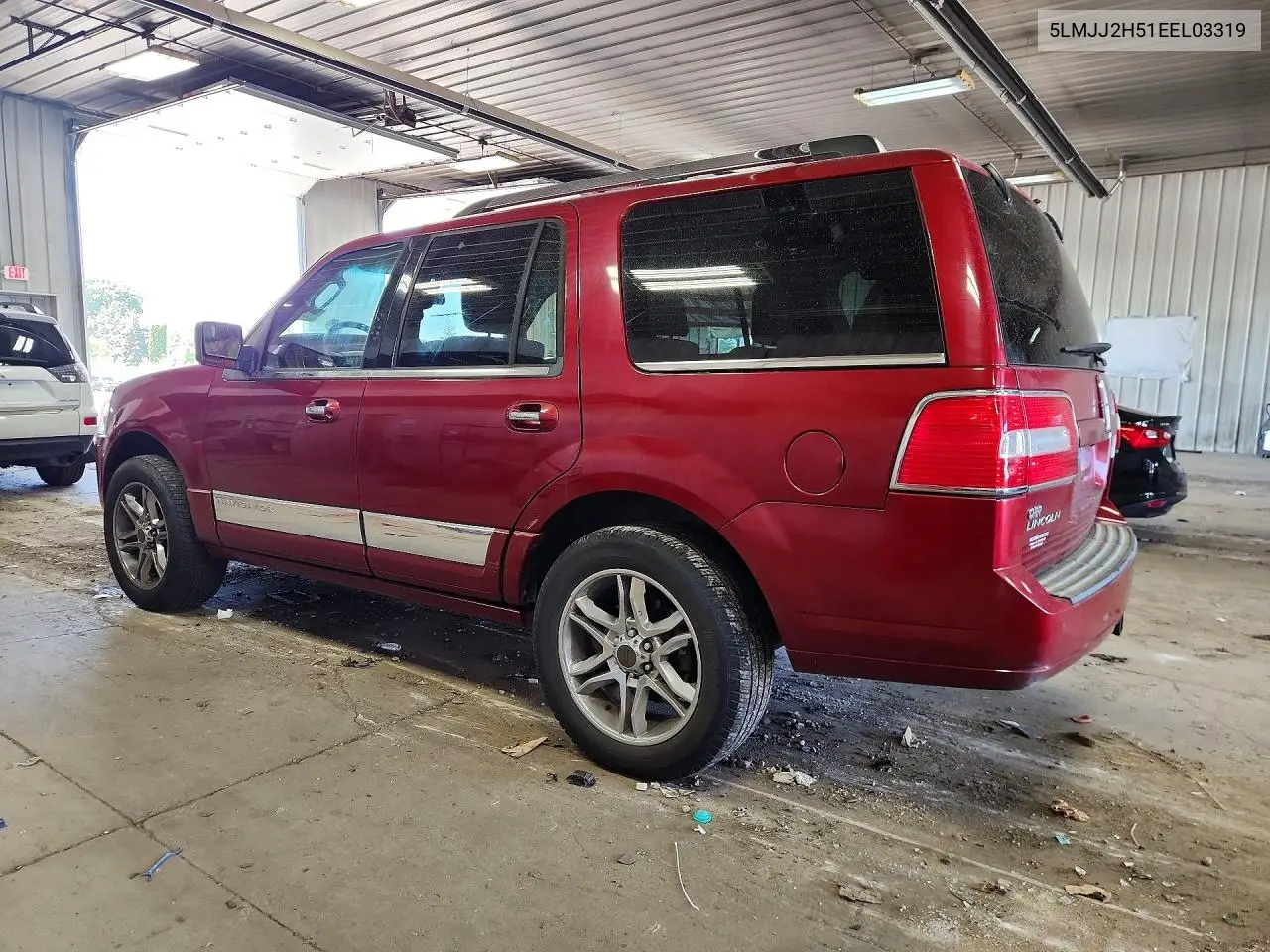 2014 Lincoln Navigator VIN: 5LMJJ2H51EEL03319 Lot: 59779476