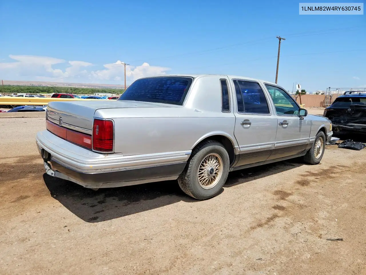 1994 Lincoln Town Car Signature VIN: 1LNLM82W4RY630745 Lot: 54813376