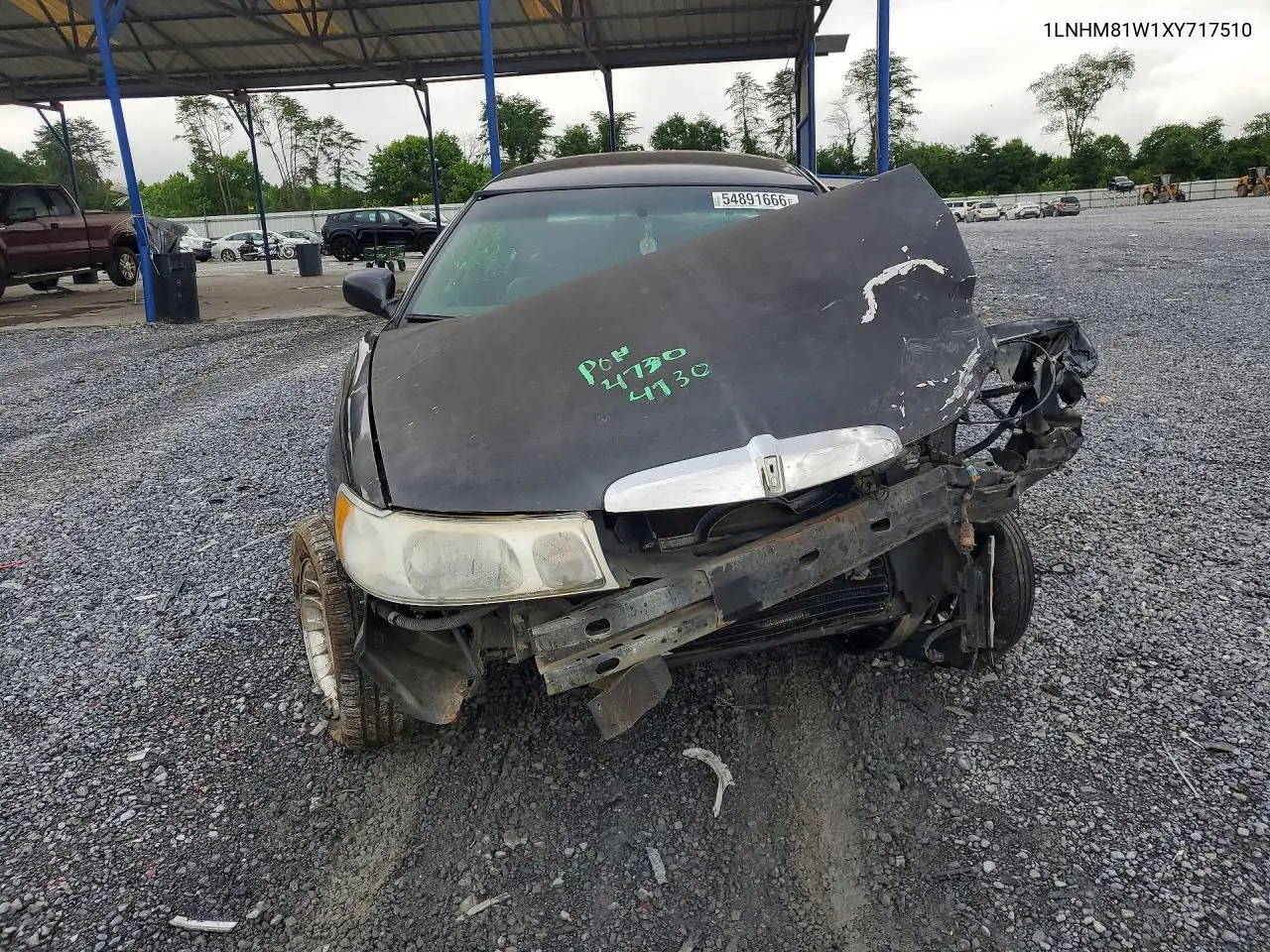 1999 Lincoln Town Car Executive VIN: 1LNHM81W1XY717510 Lot: 54891666