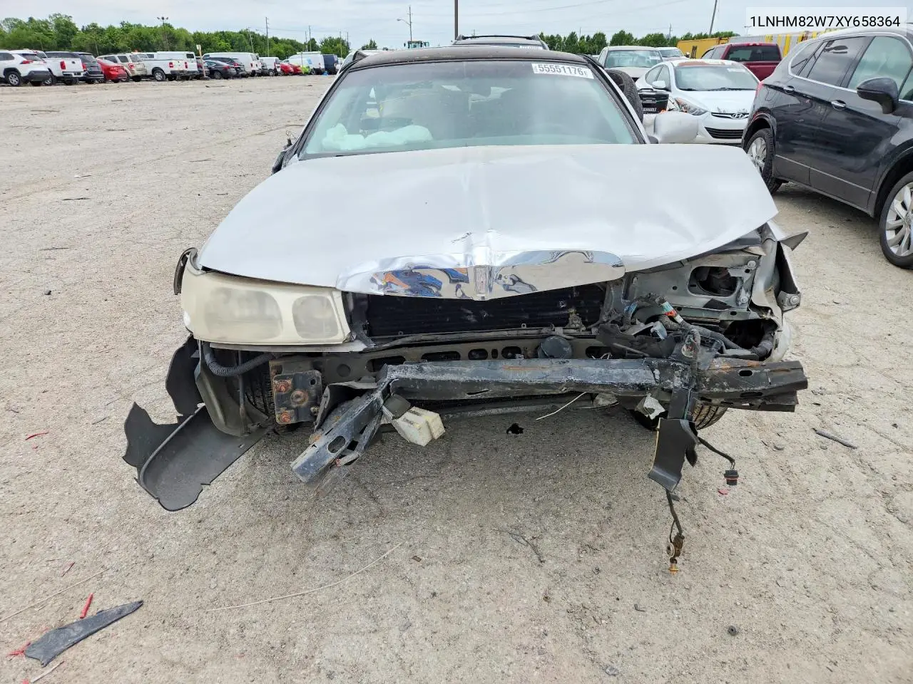 1999 Lincoln Town Car Signature VIN: 1LNHM82W7XY658364 Lot: 55551176