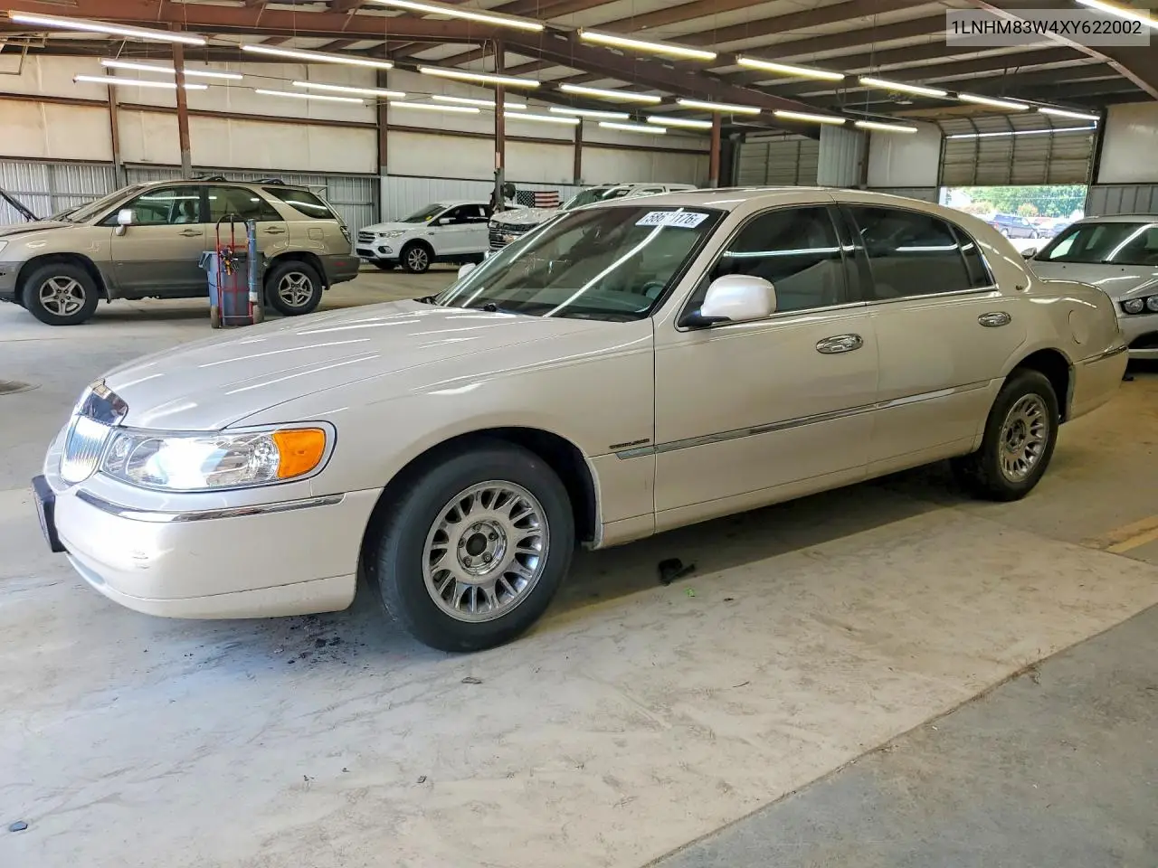 1999 Lincoln Town Car Cartier VIN: 1LNHM83W4XY622002 Lot: 58610176