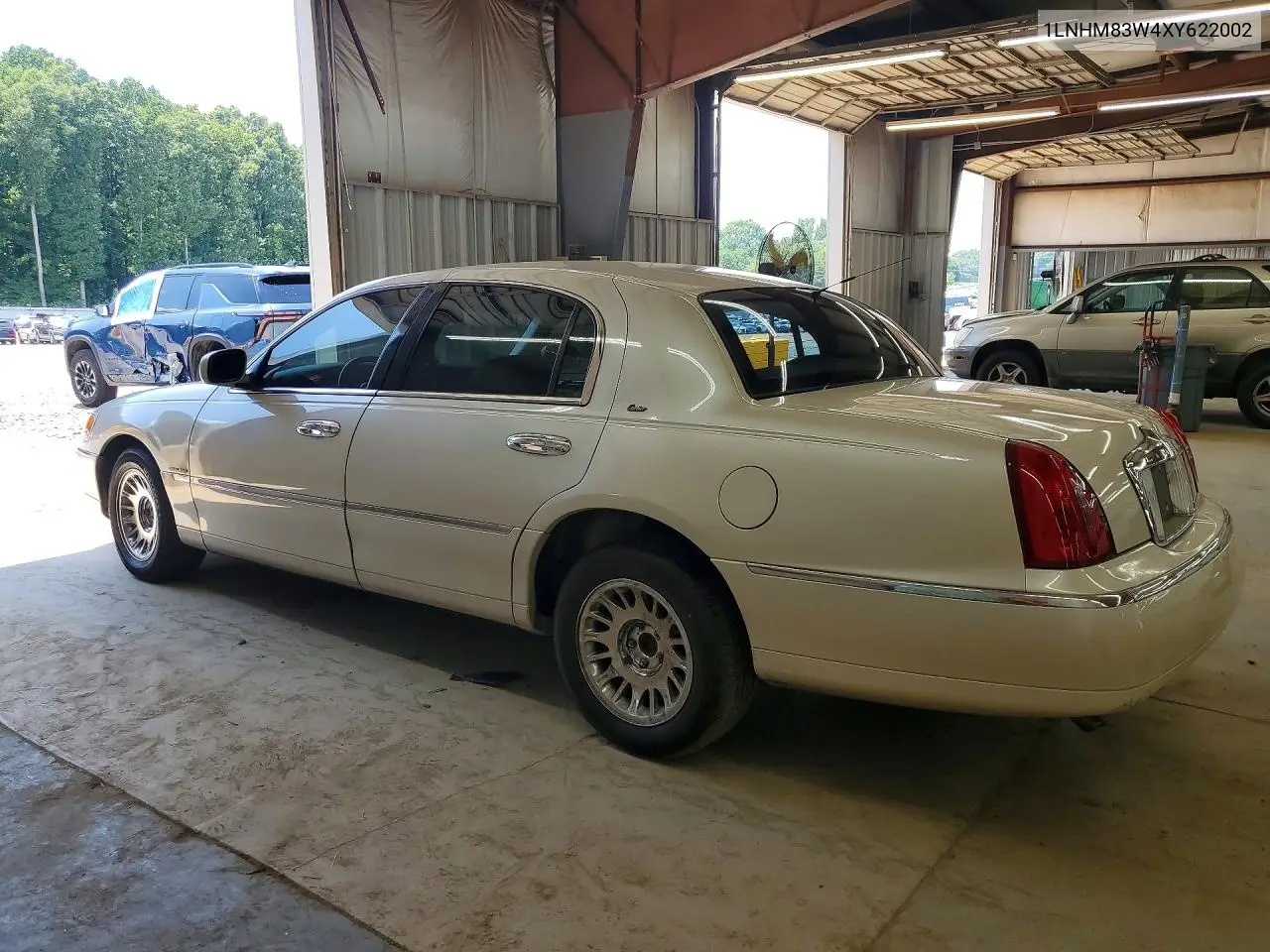1999 Lincoln Town Car Cartier VIN: 1LNHM83W4XY622002 Lot: 58610176