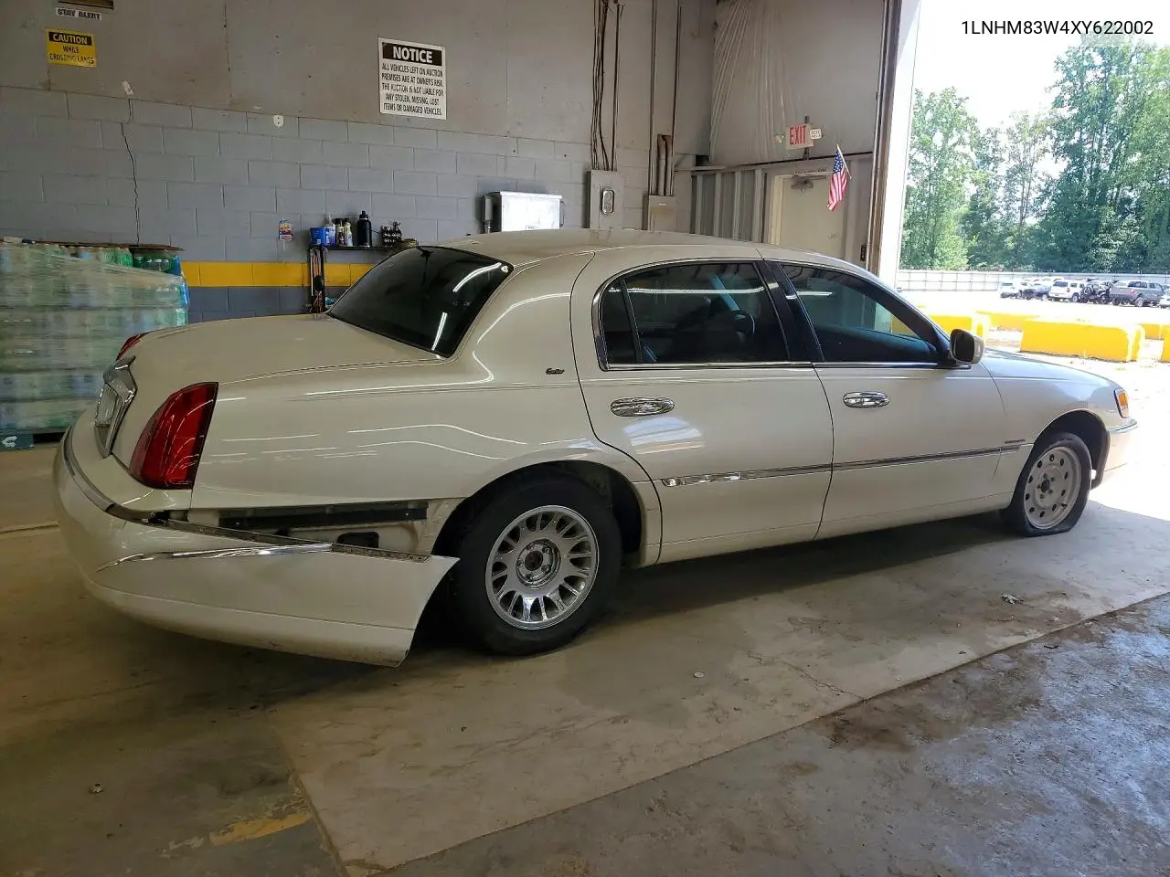 1999 Lincoln Town Car Cartier VIN: 1LNHM83W4XY622002 Lot: 58610176