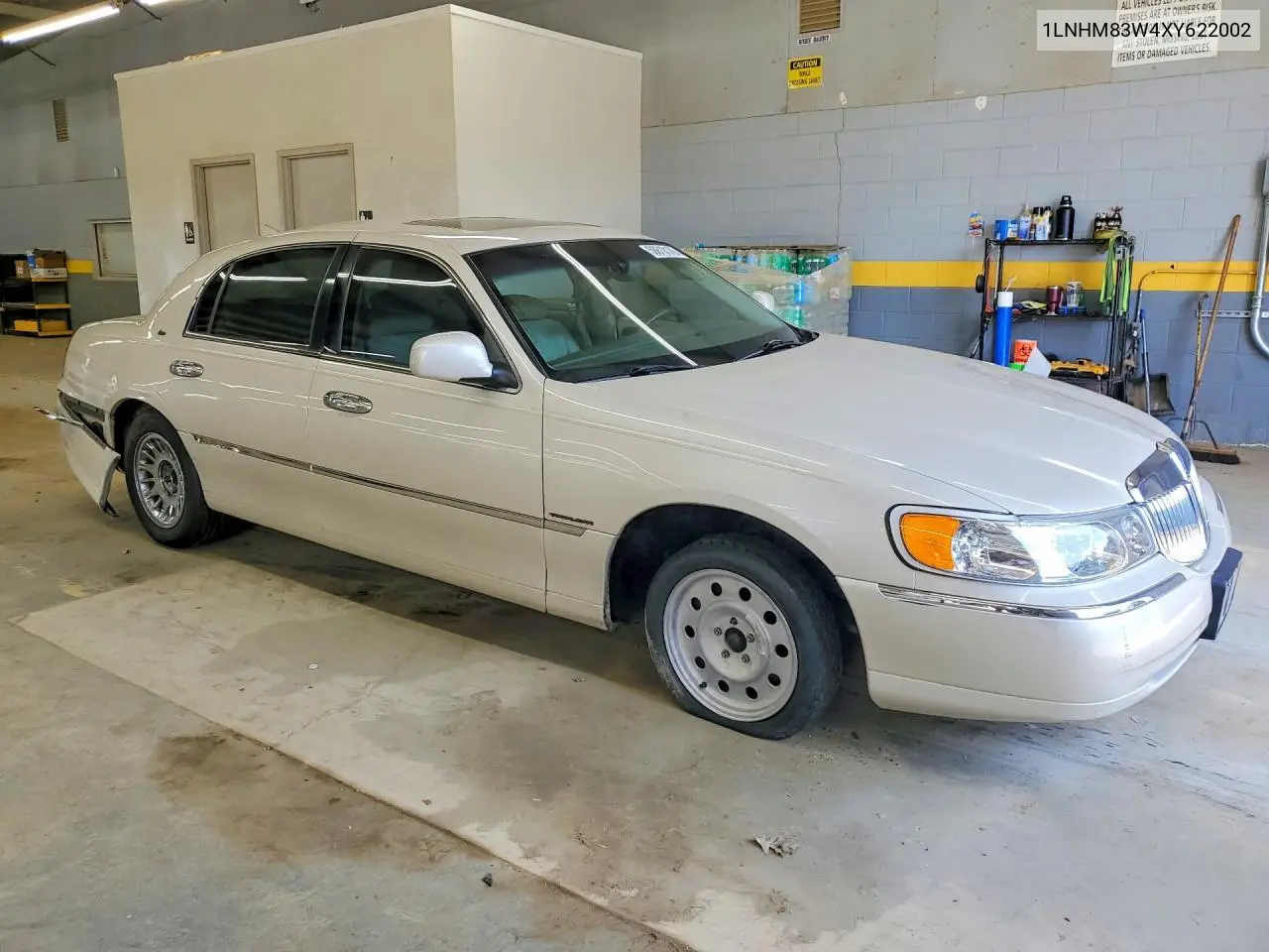 1999 Lincoln Town Car Cartier VIN: 1LNHM83W4XY622002 Lot: 58610176
