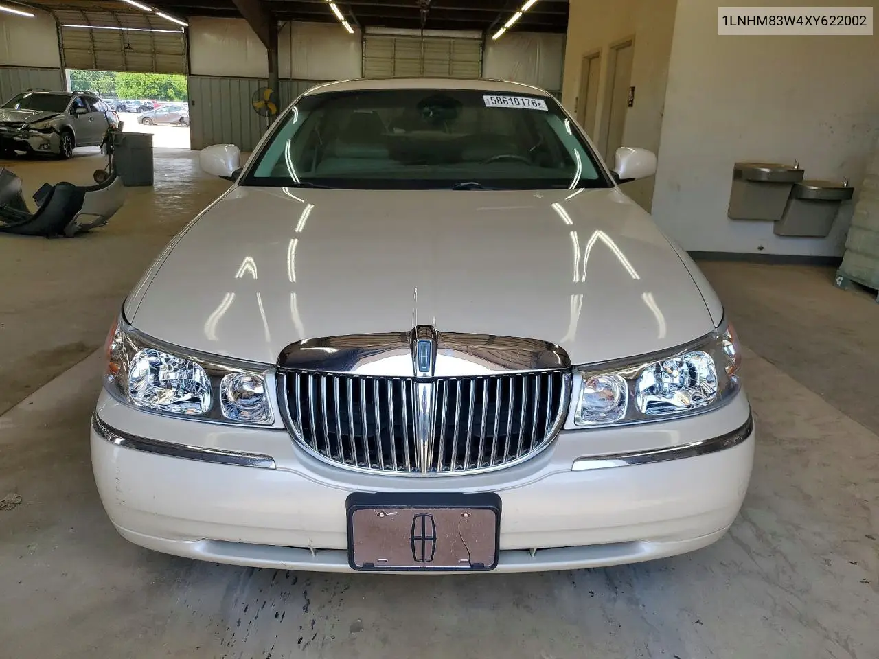 1999 Lincoln Town Car Cartier VIN: 1LNHM83W4XY622002 Lot: 58610176