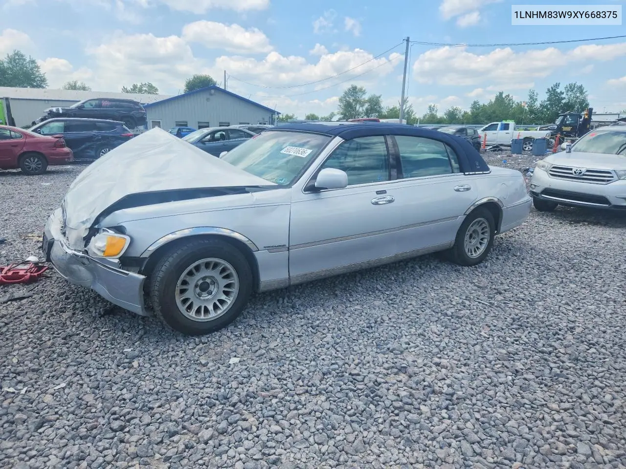 1999 Lincoln Town Car Cartier VIN: 1LNHM83W9XY668375 Lot: 60270636