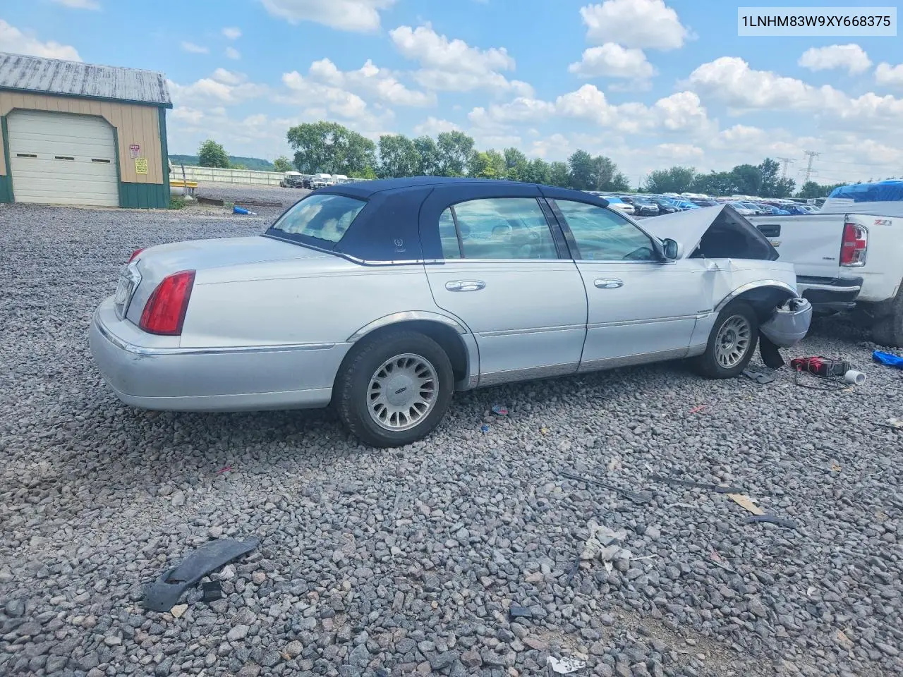 1999 Lincoln Town Car Cartier VIN: 1LNHM83W9XY668375 Lot: 60270636
