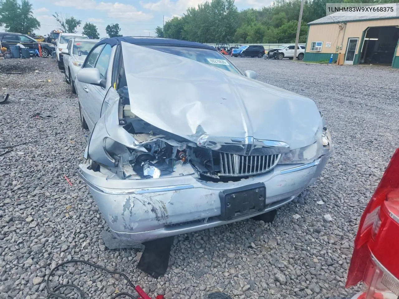 1999 Lincoln Town Car Cartier VIN: 1LNHM83W9XY668375 Lot: 60270636