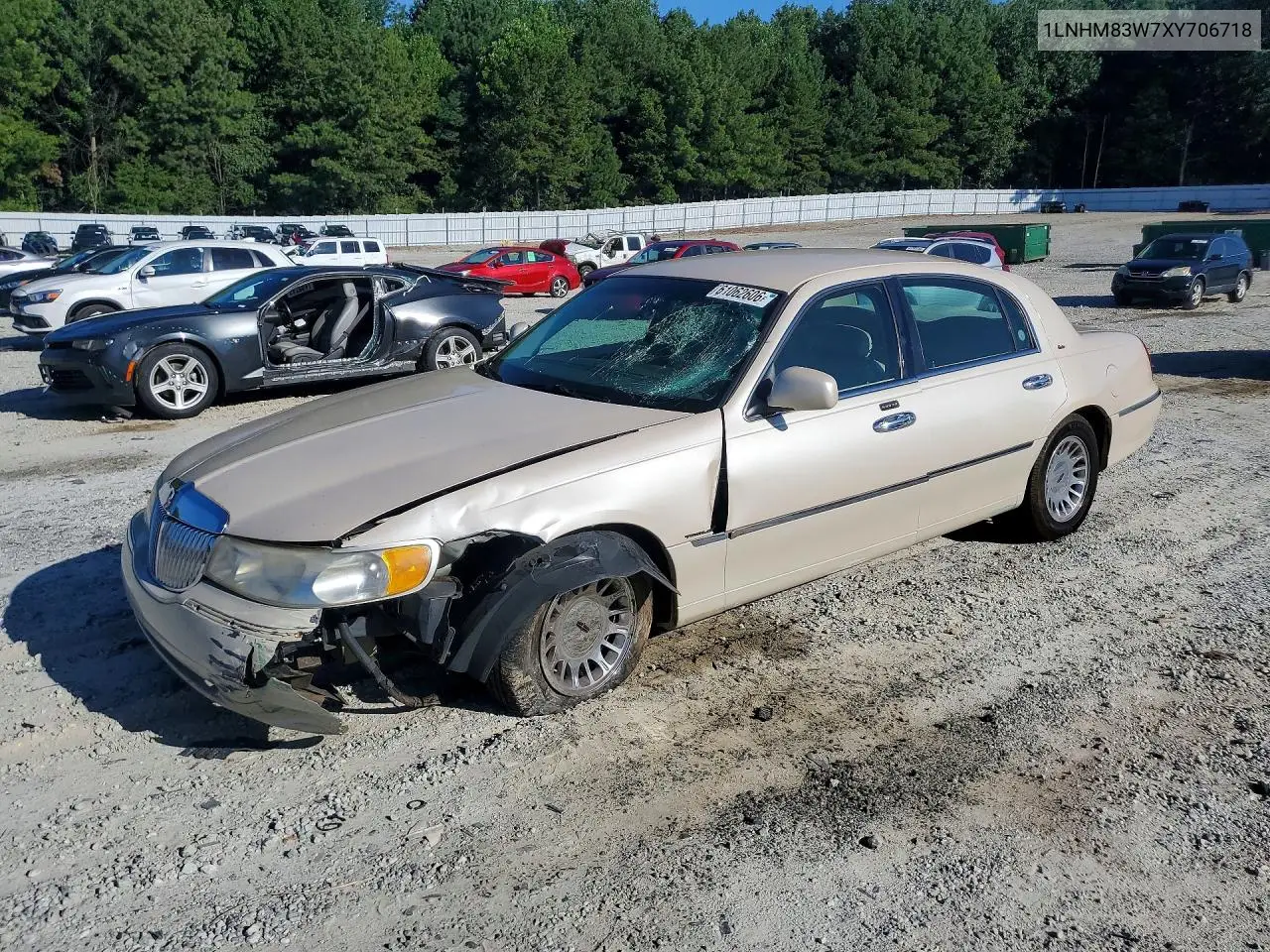 1999 Lincoln Town Car Cartier VIN: 1LNHM83W7XY706718 Lot: 61062606