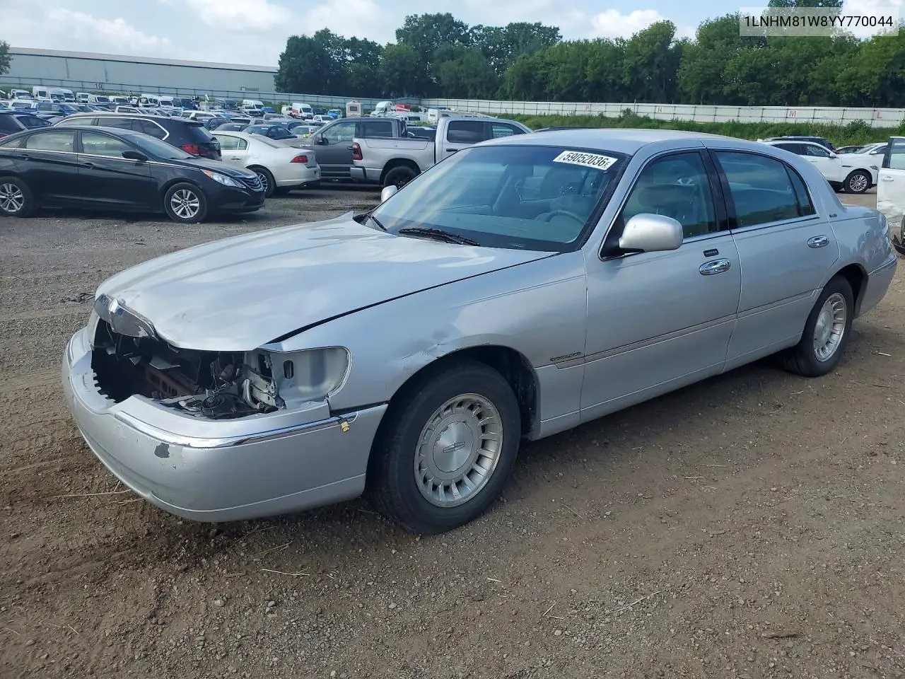 2000 Lincoln Town Car Executive VIN: 1LNHM81W8YY770044 Lot: 59052036