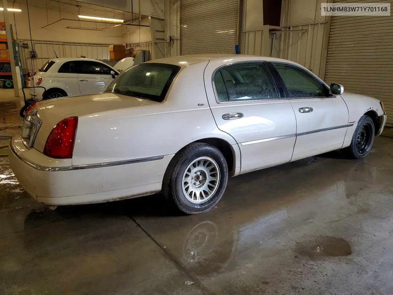 2001 Lincoln Town Car Cartier VIN: 1LNHM83W71Y701168 Lot: 57316476