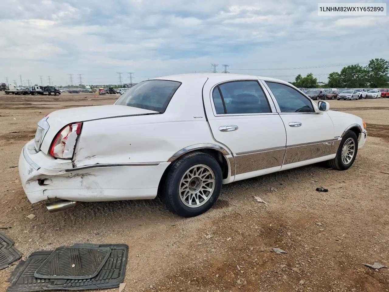 2001 Lincoln Town Car Signature VIN: 1LNHM82WX1Y652890 Lot: 59655226
