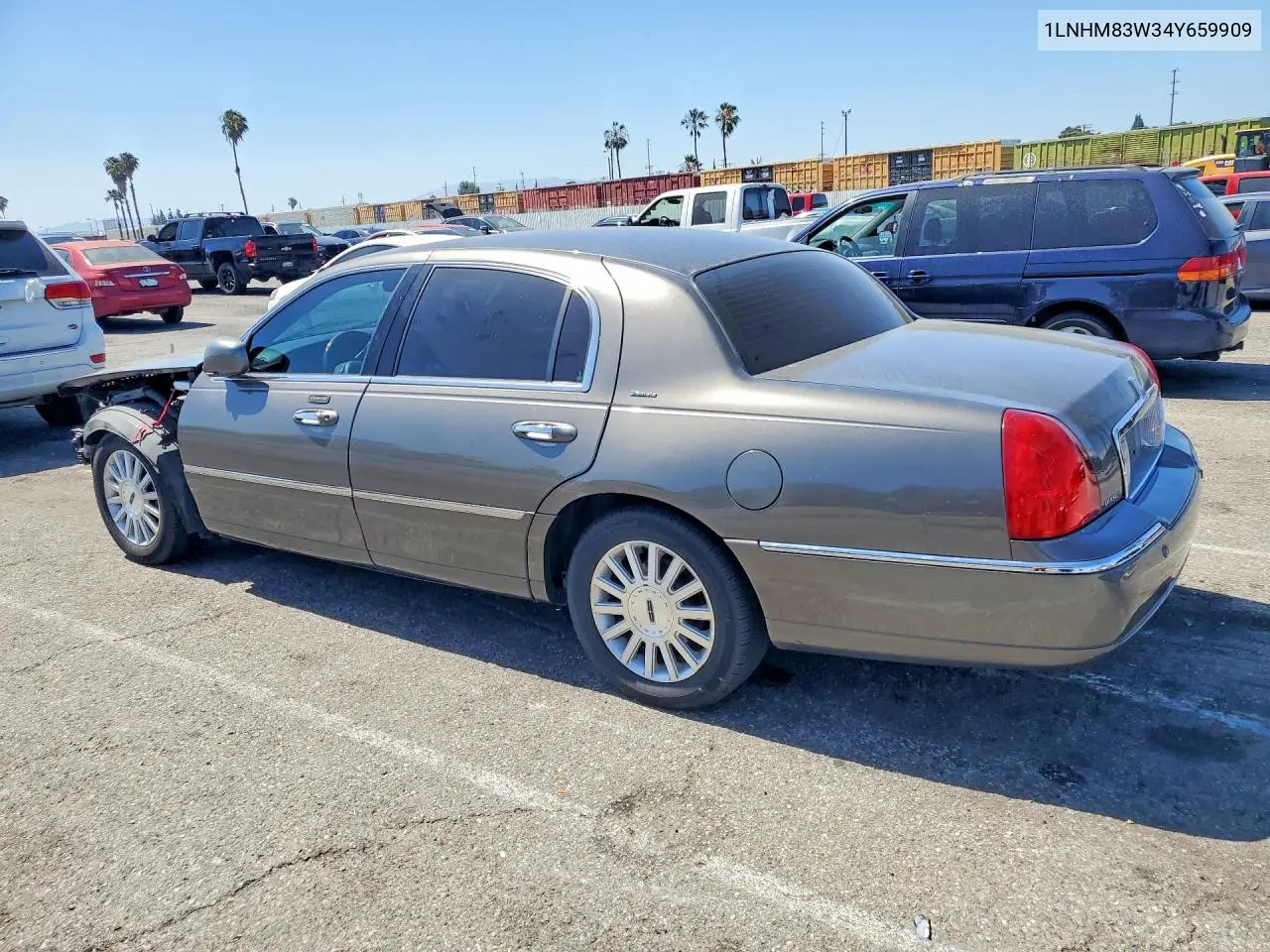 2004 Lincoln Town Car Ultimate VIN: 1LNHM83W34Y659909 Lot: 55579666