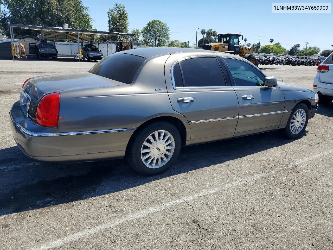 2004 Lincoln Town Car Ultimate VIN: 1LNHM83W34Y659909 Lot: 55579666