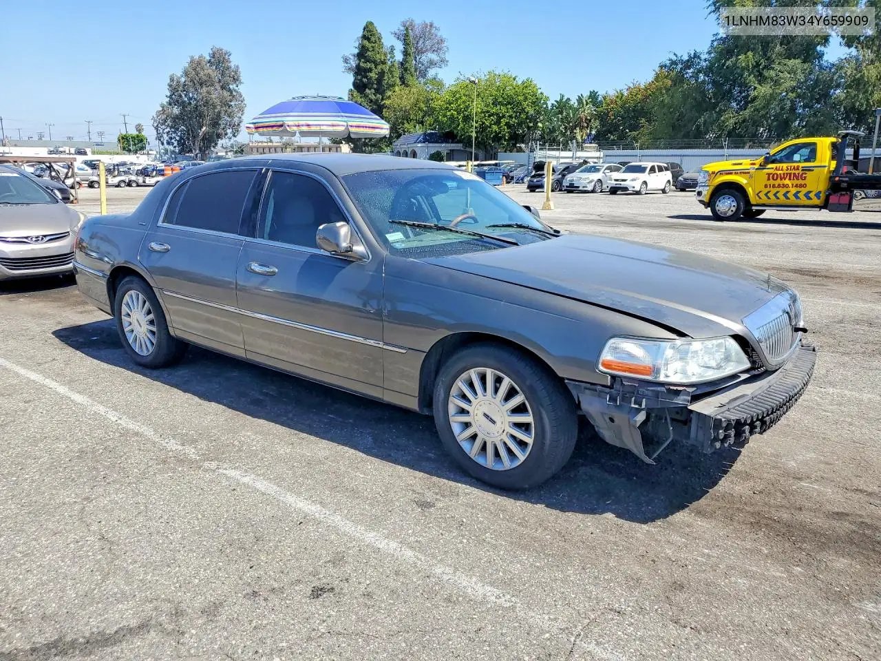 2004 Lincoln Town Car Ultimate VIN: 1LNHM83W34Y659909 Lot: 55579666