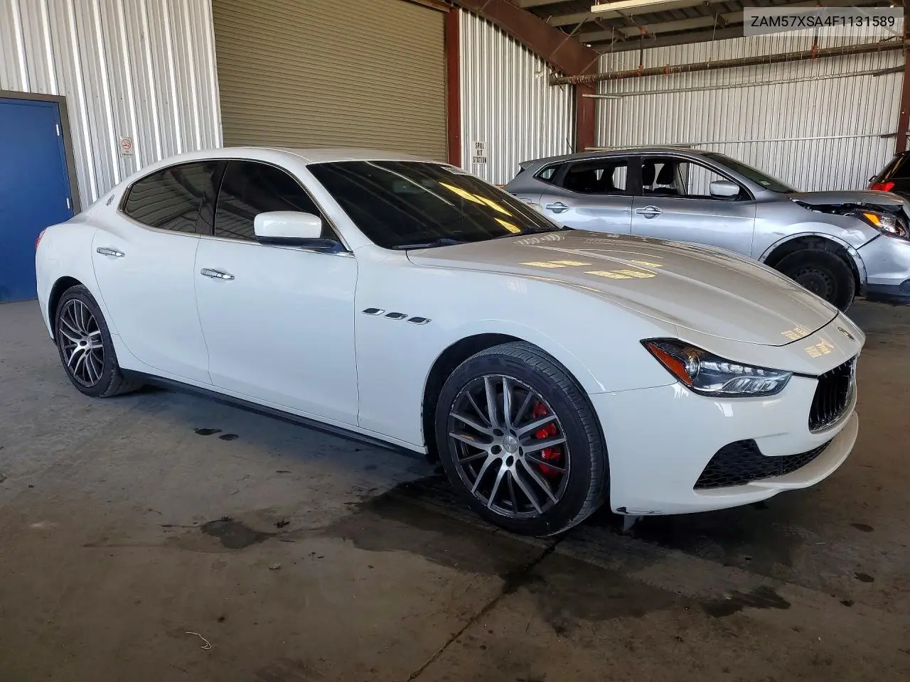 2015 Maserati Ghibli VIN: ZAM57XSA4F1131589 Lot: 59665446