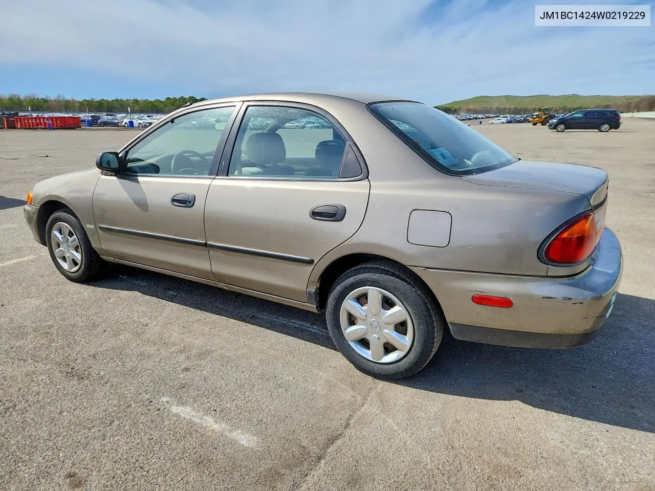 1998 Mazda Protege Lx VIN: JM1BC1424W0219229 Lot: 51718656