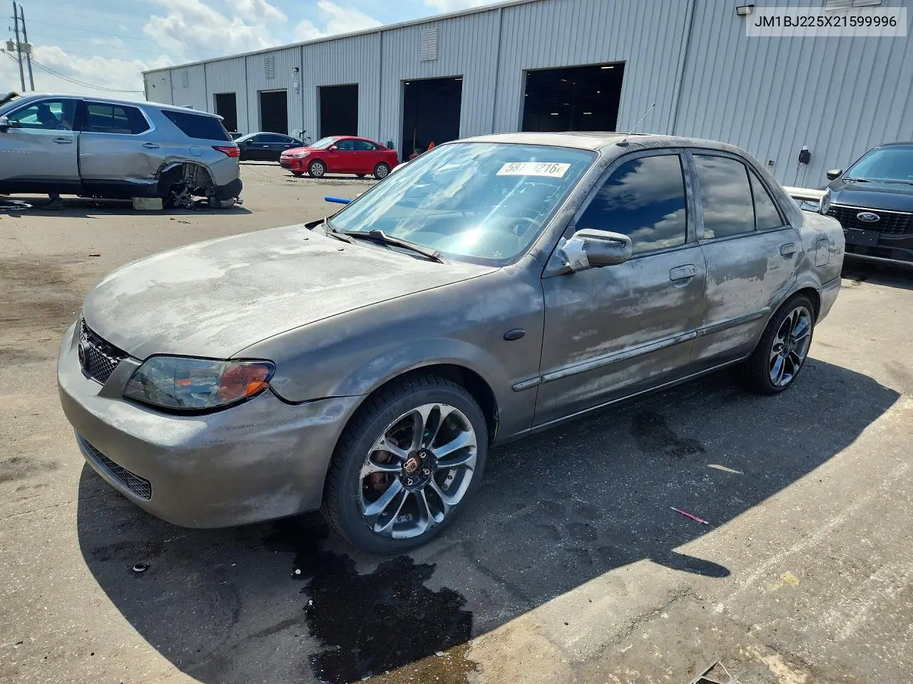 2002 Mazda Protege Dx VIN: JM1BJ225X21599996 Lot: 58704216