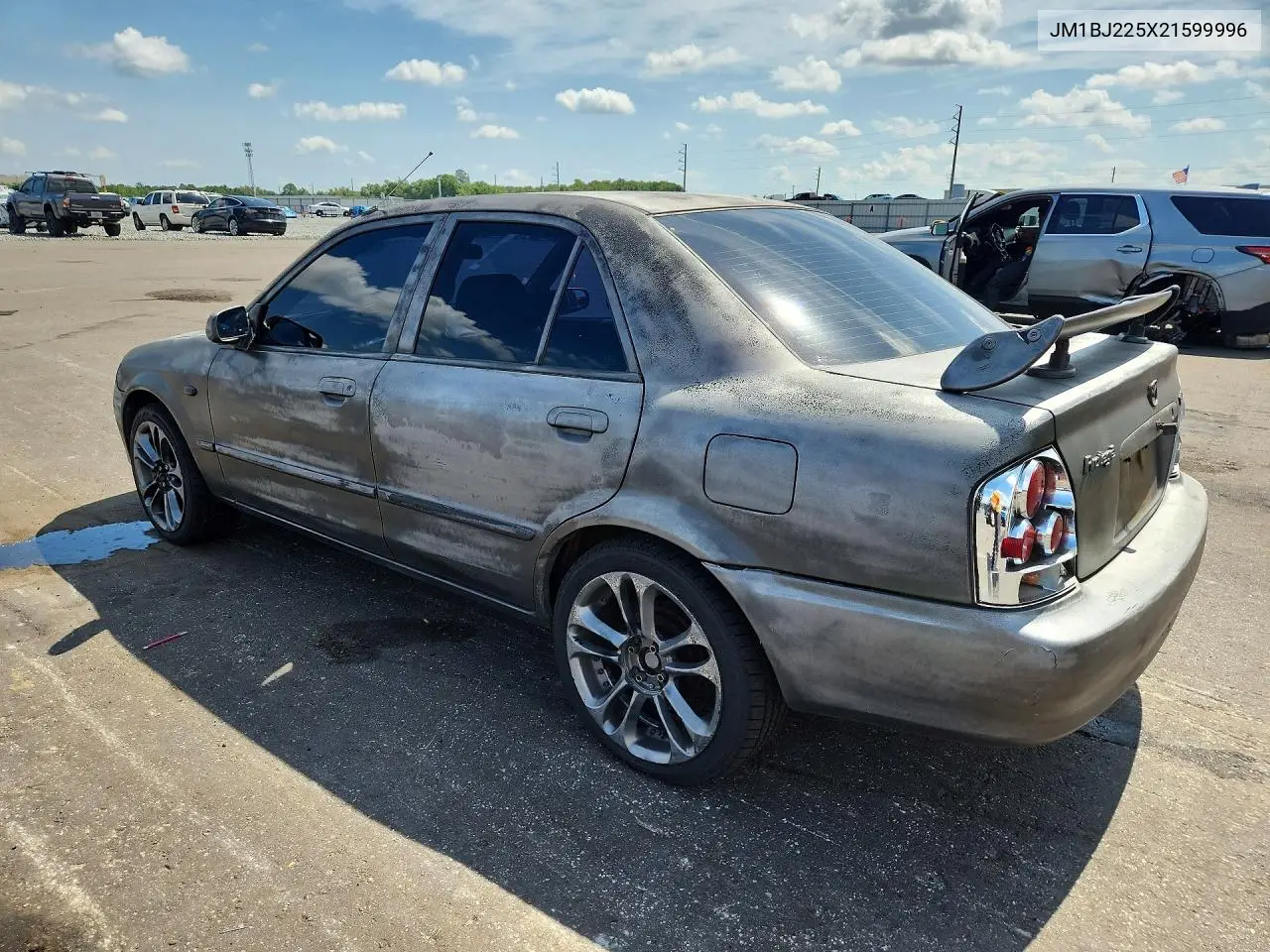 2002 Mazda Protege Dx VIN: JM1BJ225X21599996 Lot: 58704216