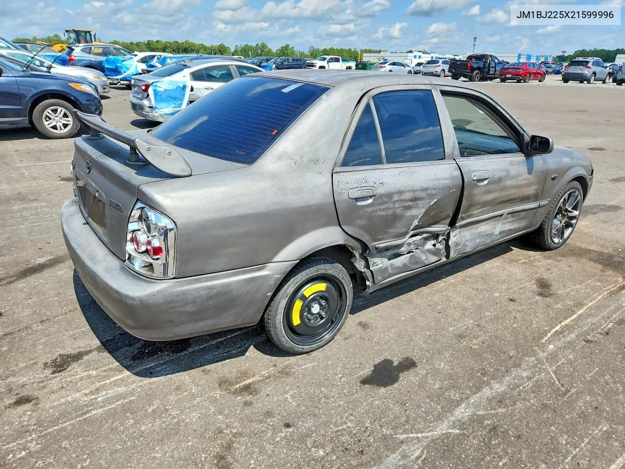 2002 Mazda Protege Dx VIN: JM1BJ225X21599996 Lot: 58704216