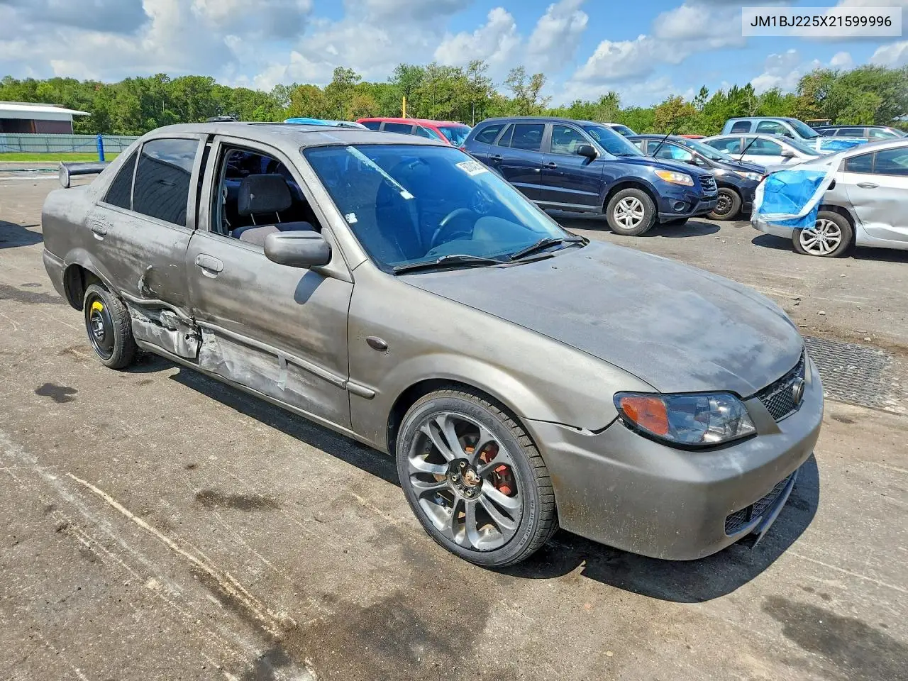 2002 Mazda Protege Dx VIN: JM1BJ225X21599996 Lot: 58704216