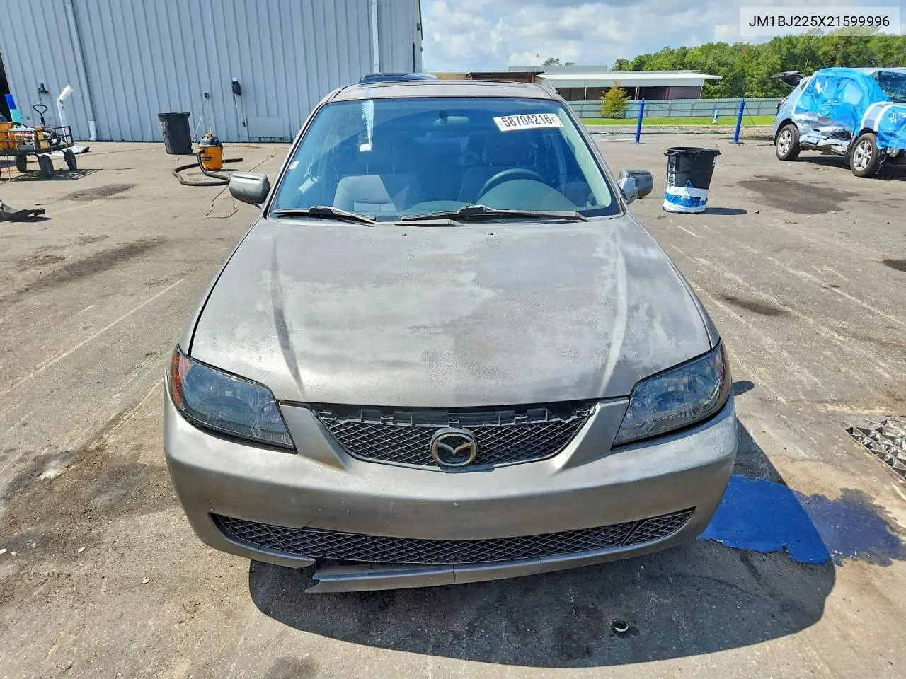 2002 Mazda Protege Dx VIN: JM1BJ225X21599996 Lot: 58704216