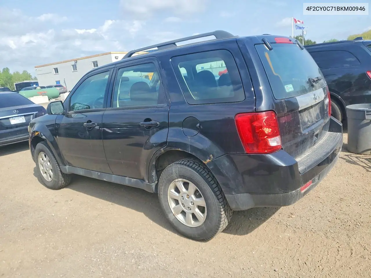 2011 Mazda Tribute I VIN: 4F2CY0C71BKM00946 Lot: 54006266
