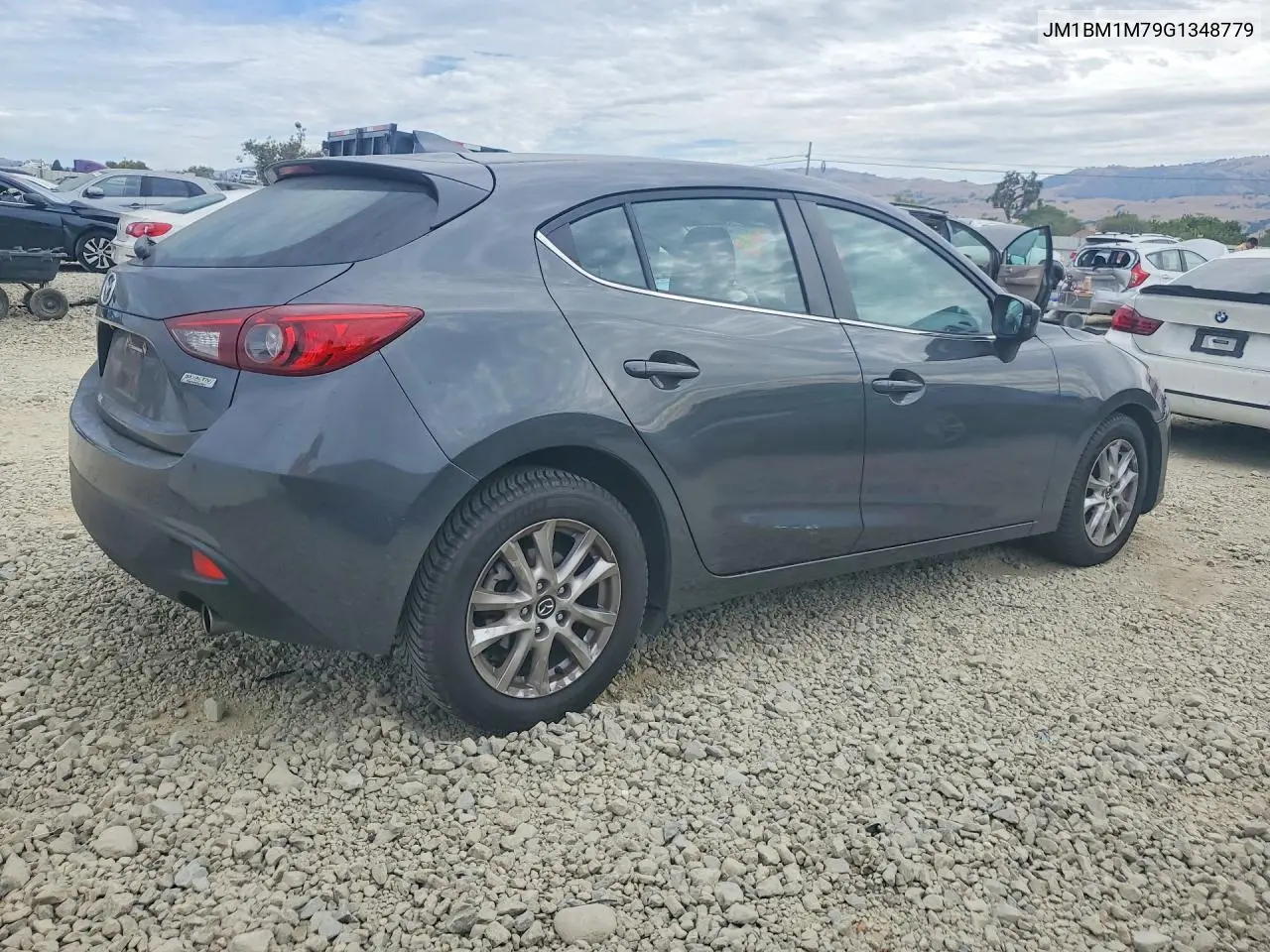 2016 Mazda 3 Touring VIN: JM1BM1M79G1348779 Lot: 61735216