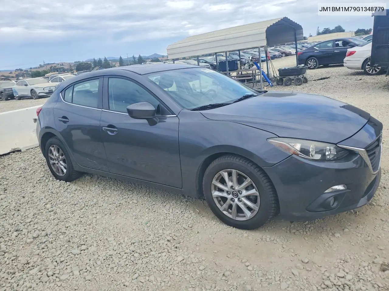 2016 Mazda 3 Touring VIN: JM1BM1M79G1348779 Lot: 61735216