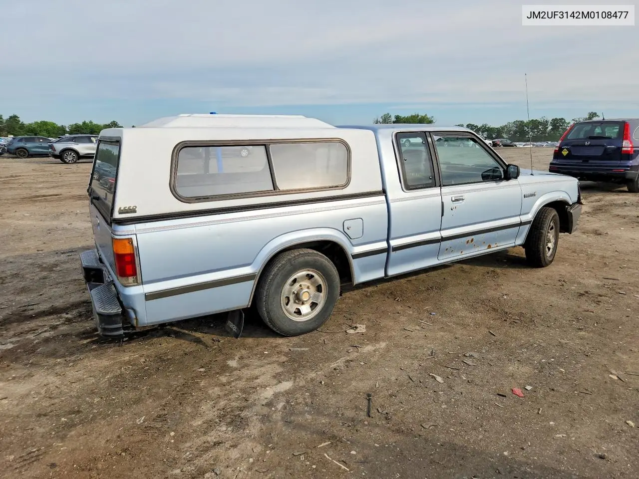 1991 Mazda B2600 Cab Plus VIN: JM2UF3142M0108477 Lot: 58453776