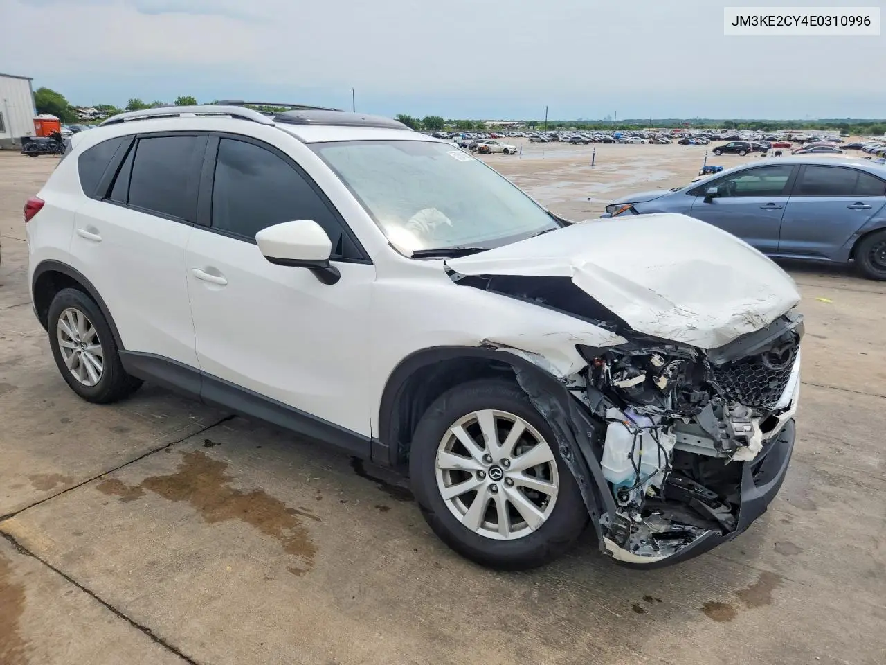2014 Mazda Cx-5 Touring VIN: JM3KE2CY4E0310996 Lot: 57587066
