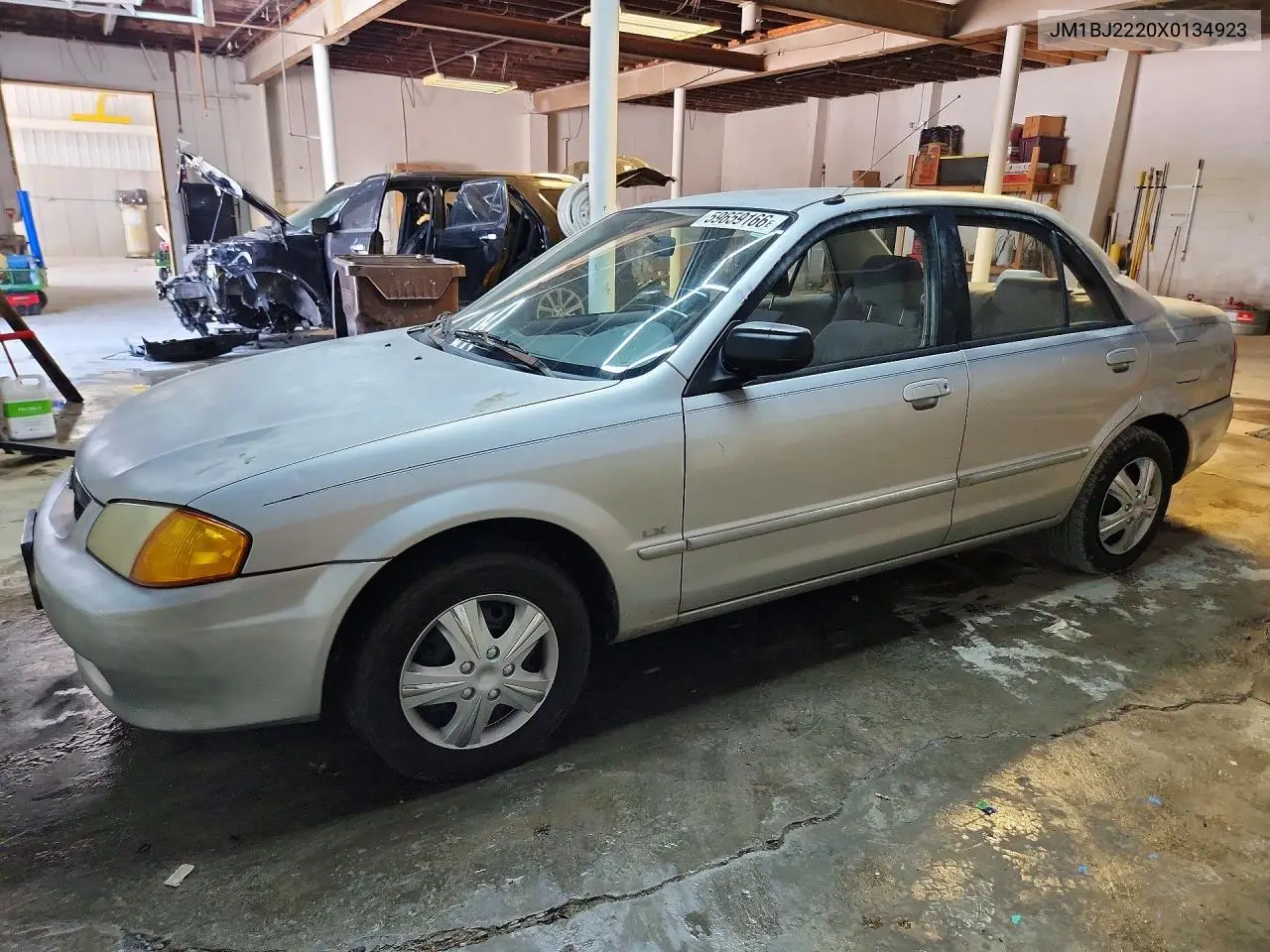 1999 Mazda Protege Lx VIN: JM1BJ2220X0134923 Lot: 59659166
