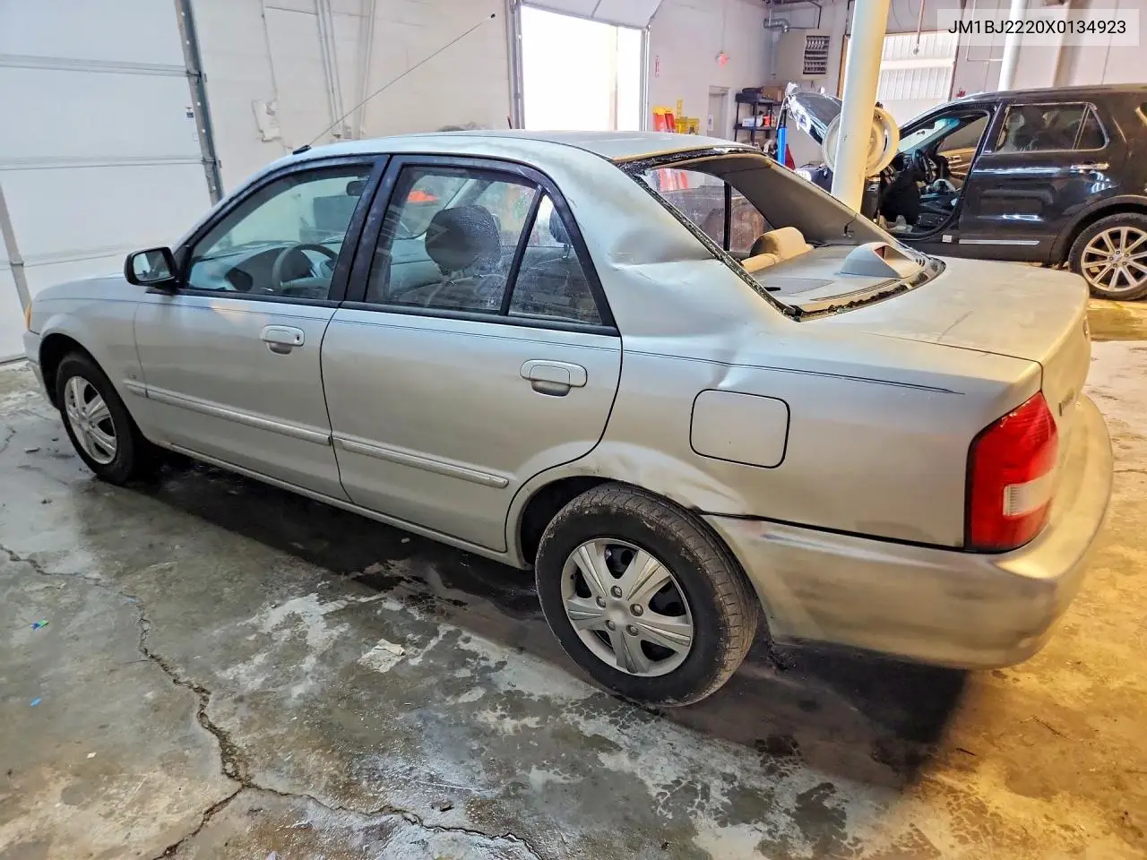 1999 Mazda Protege Lx VIN: JM1BJ2220X0134923 Lot: 59659166