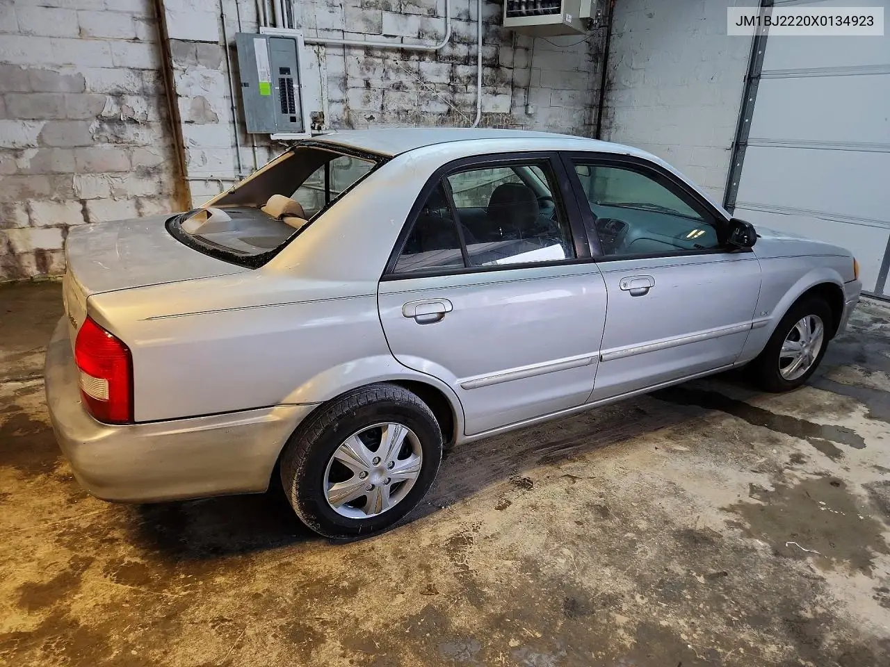 1999 Mazda Protege Lx VIN: JM1BJ2220X0134923 Lot: 59659166